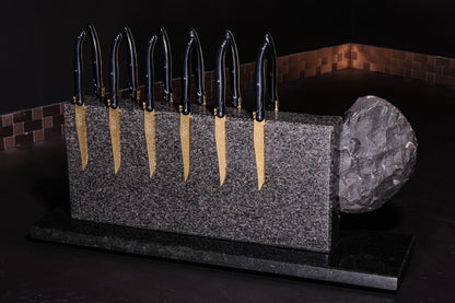 Knife block made of Nero Impala with a black ammonite