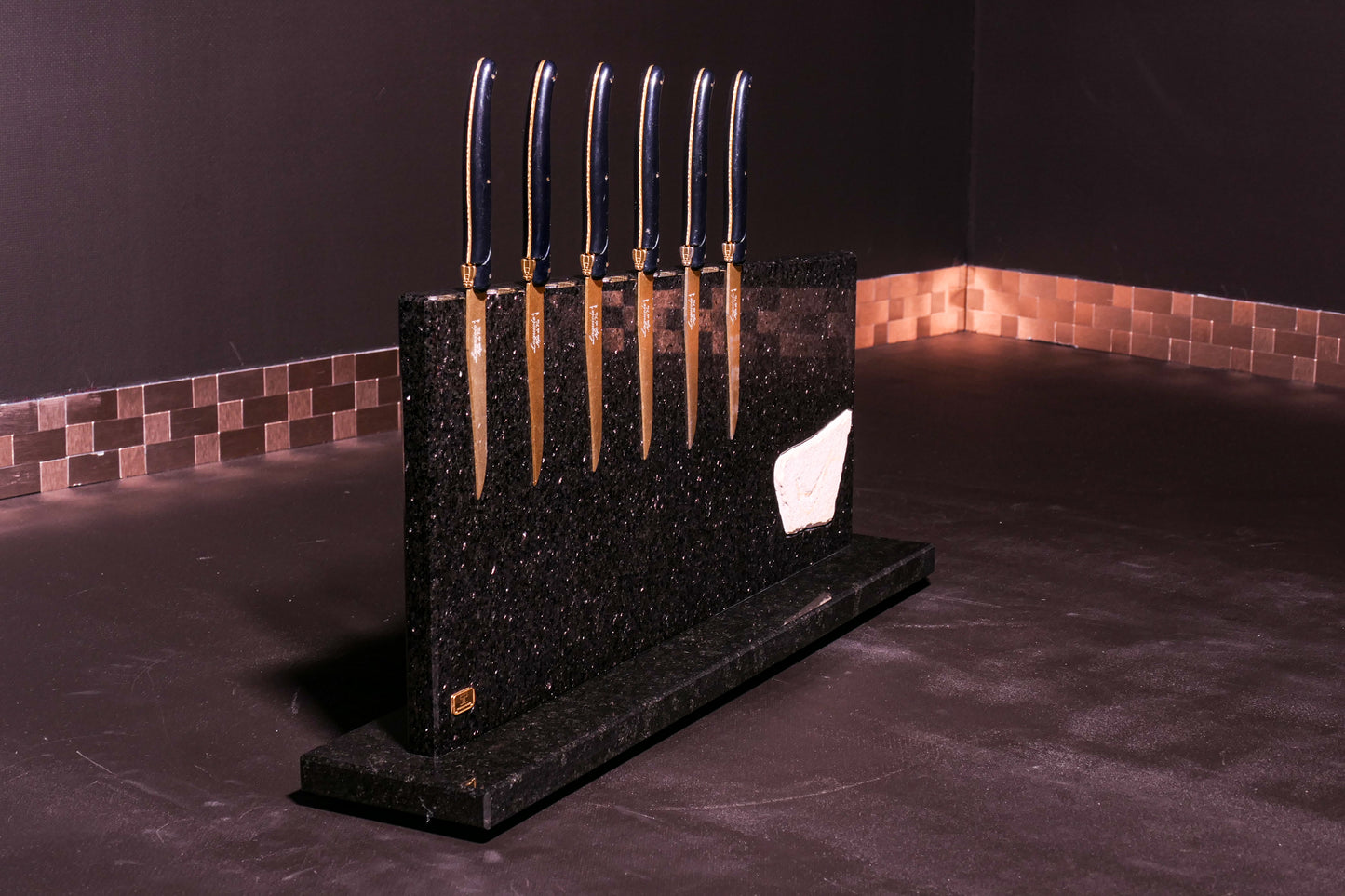 Star Galaxy Gold knife block with a fossilized fish