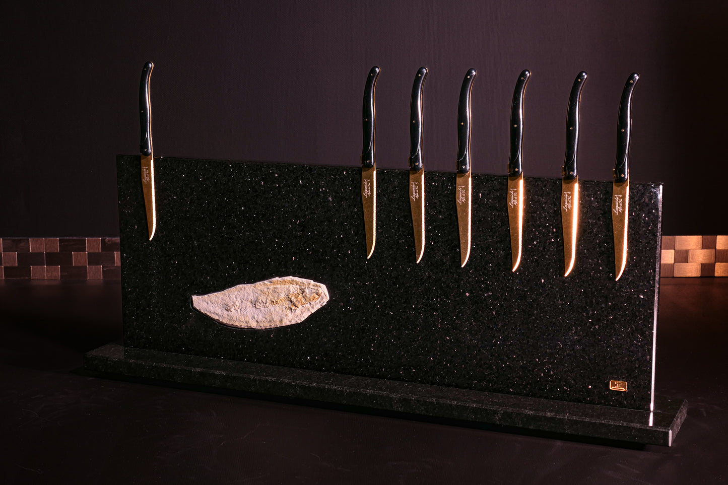 Star Galaxy Gold knife block with a fossilized fish